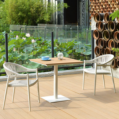 Mesa y silla al aire libre de tela de caña combinación de patio de hotel terraza jardín balcón café tela de caña mesa y silla de lujo al aire libre