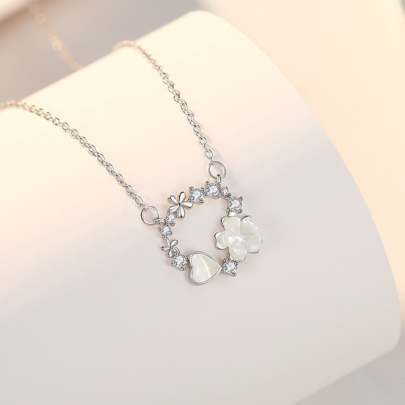 S925 plata de ley collar de corona de mariposa de lujo ligero flor femenina diseño de alta calidad cadena de clavícula joyería San Valentín