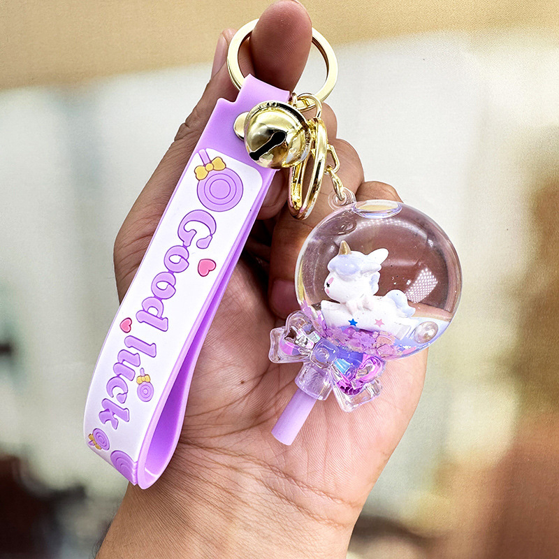 Púrpura estrella de cinco puntas líquido Quicksand llavero chica corazón flor de cerezo aceite colgante lindo tridimensional mochila adornos para mujeres