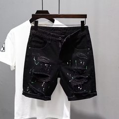 夏の穴の薄いデニムの半ズボンの男性の黒色の百合は流行しています。
