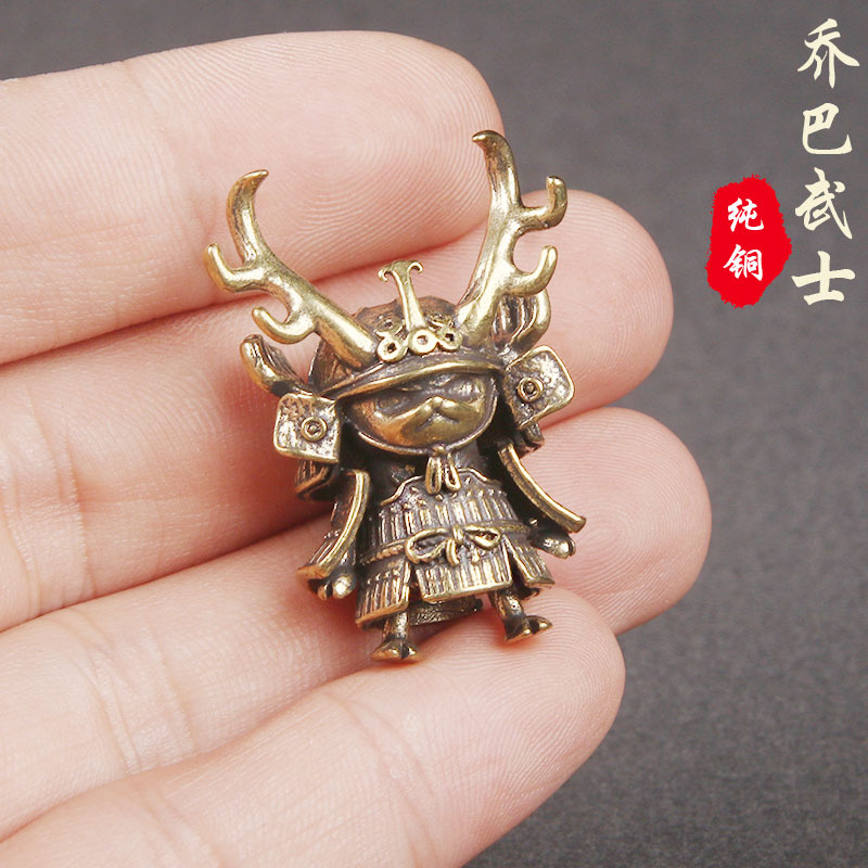 Brass doll
