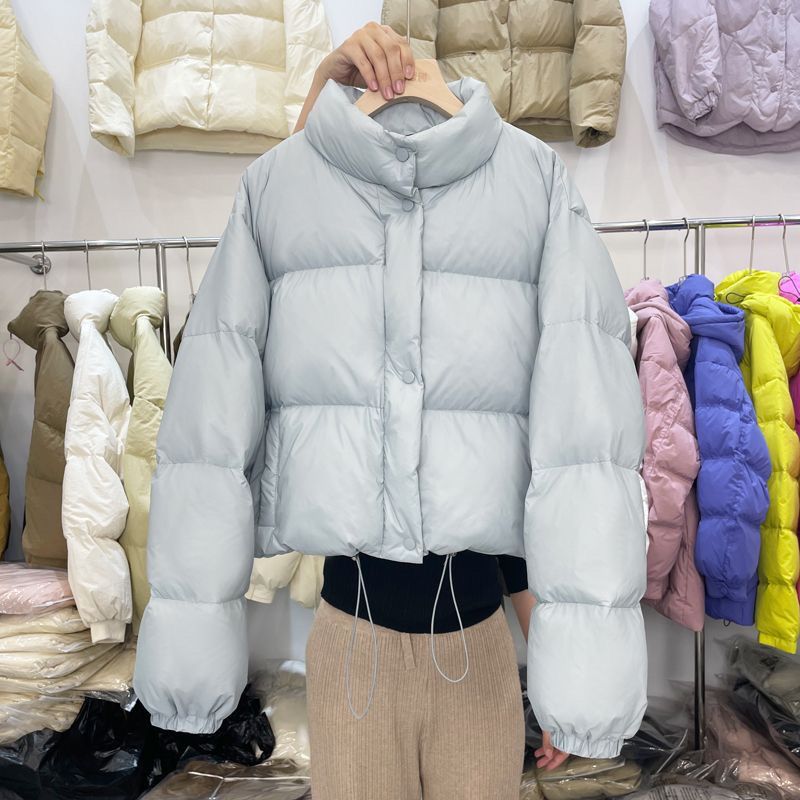 Dames donsjas met opstaande kraag witte eendendons winter_voghion.com
