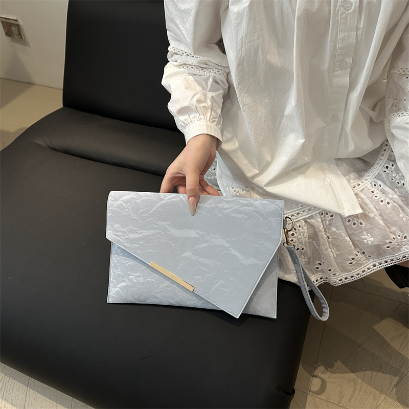 Bolsos pequeños de nicho, bolsos de mujer, nuevos embragues de todo fósforo de moda, populares de este año, embragues de alta gama, sobre