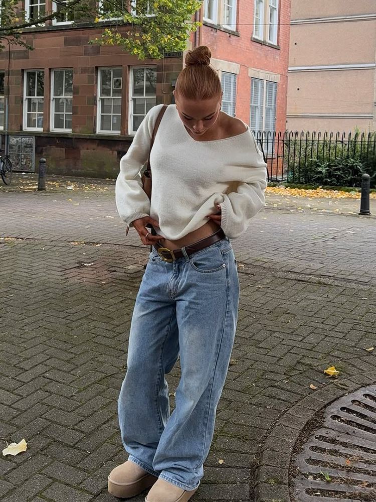 Moda simple suéter de punto de cuello en V de color sólido suéter de estilo europeo y americano 2025 nuevo otoño y invierno