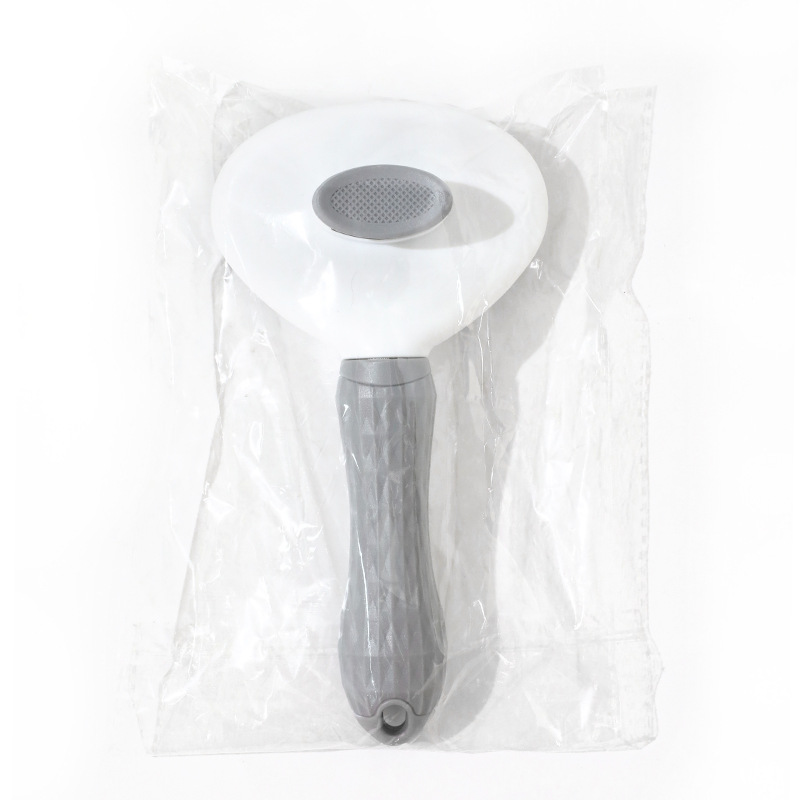 Mascota especial auto-limpieza peine en stock aguja de acero inoxidable mango suave cepillo de alambre gato flotante pelo gato peine suministros al por mayor