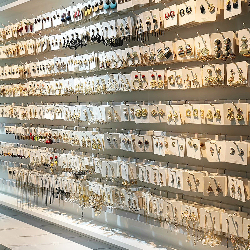 Estilo explosivo, temperamento de celebridad de Internet, puesto callejero, suministro de mercado nocturno, pendientes de moda coreana femenina, pendientes de lujo ligero, pendientes de alta gama al por mayor