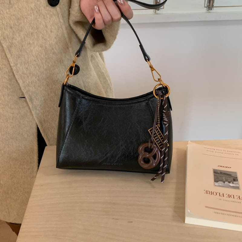 小众ins气质OL女士单肩腋下包潮2025流行复古宽肩带通勤百搭女包