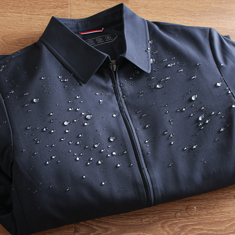 La empresa OM fuera de línea de mil yuanes negocio ligero acolchado engrosada chaqueta de mediana edad de los hombres de la solapa adhesiva cálido abrigo de algodón acolchado de invierno