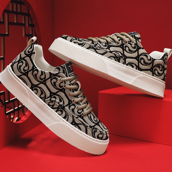 Zapatos de lona de corte bajo para hombre primavera y otoño 2024 nuevas zapatillas de deporte con estampado de corte bajo de nicho zapatos de moda casuales deportivos de plataforma para hombre