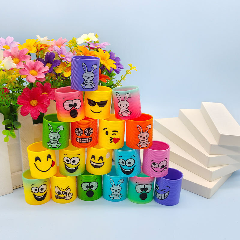 Regalo de trompeta de anillo de primavera de venta caliente transfronteriza, rompecabezas, nostalgia, sonrisas sonrientes apiladas, música mágica círculo del arco iris
