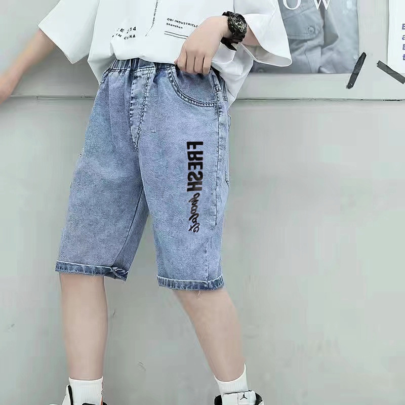 男の子のデニムの7分のズボンの夏の薄いタイプの子供の半ズボンの子供の中でズボンの中で大きい子供の男の子のズボンのファッションは代行します。|undefined