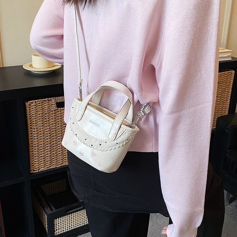 Amor extranjero en relieve, bolsas de cestas para niños y niñas, bolsas de mano de encaje dulce coreana, nuevas bolsas de niños transfronterizas