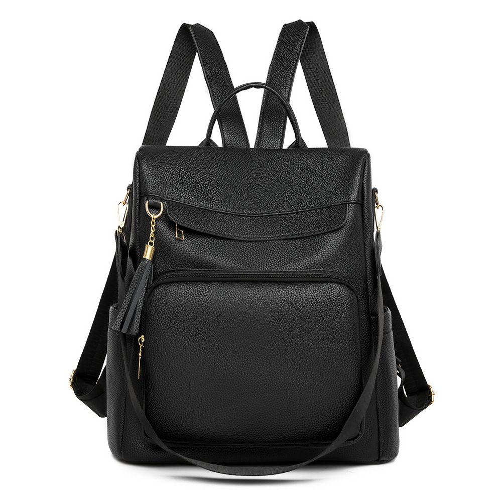 2024 nuevas damas casuales de cuero suave mochila antirrobo moda borla color de contraste mochila de viaje de gran capacidad al por mayor