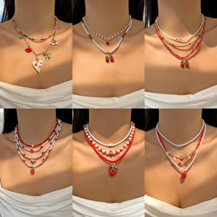 Cross-border European and American best-selling necklace jewelry fashion bohemian style strawberry love bow pendant necklace set