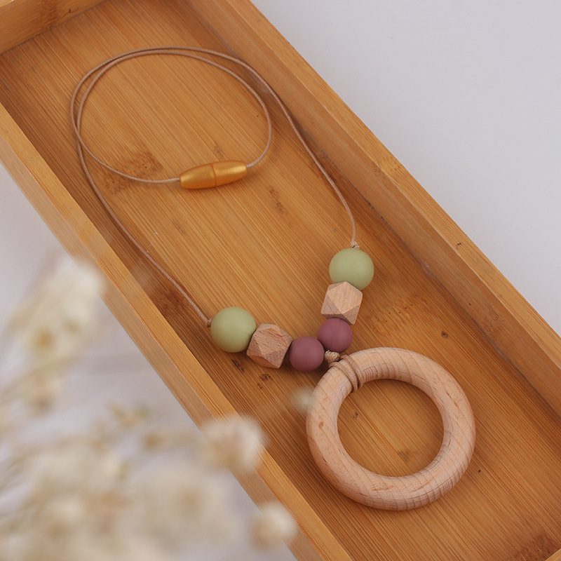 Anillo de haya collar de lactancia de silicona bebé molar collar de madre collar de mordedor