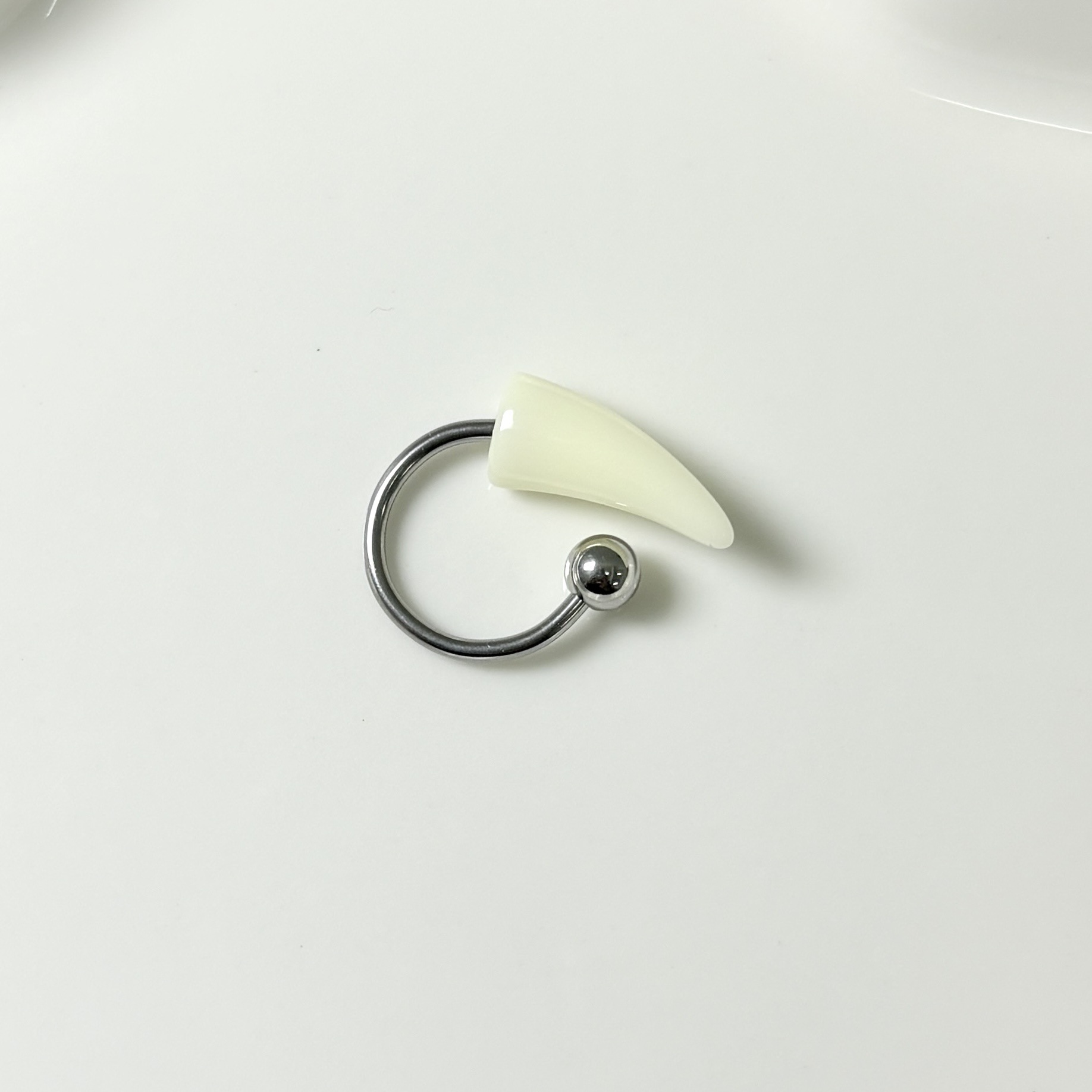 Pointed labret stud close-up product detail