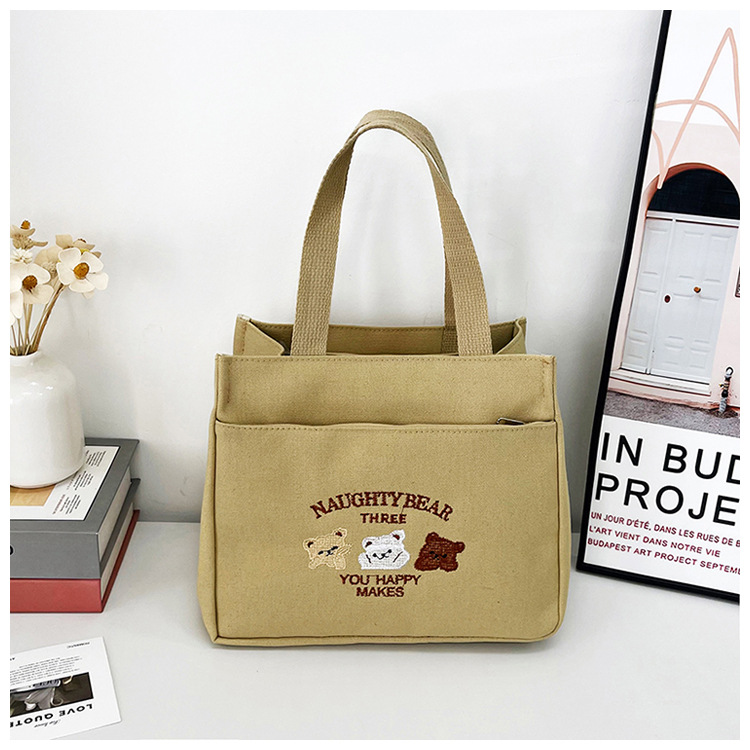 New wholesale fashionable and high-quality canvas handbag, simple and portable, easy to carry for going out, versatile lunch box and bento bag undefined