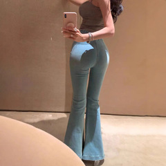 綿質の青いヒップアップのジーパンの女性の弾力性は肌にキスして身を修めるズボンの高い腰の小さいラッパのズボンを修理します。
