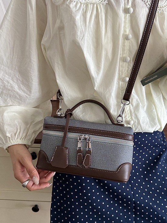 Caja de mano retro europea y americana bolsos pequeños cuadrados de mujeres nuevas ventas calientes transfronterizas pu color de empalme de hombro único bolso de tramo inclinado