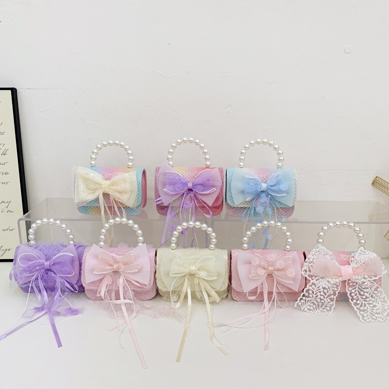 Bolso de cadena de niña de estilo pequeño de fragancia coreana, bolso de bebé de perlas con lazo de encaje, mini bolso para niños de estilo occidental