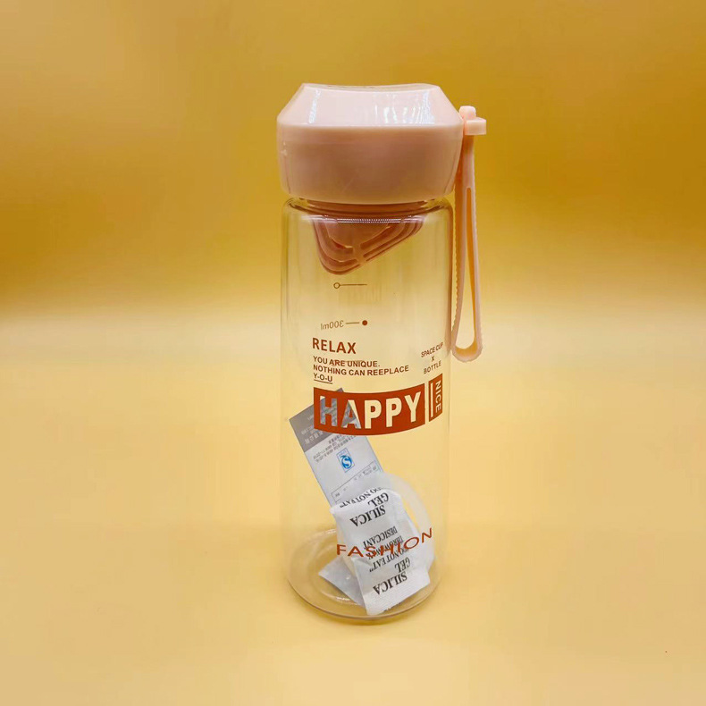 Futong taza de plástico para el hogar taza de agua para estudiantes taza de mano femenina taza de té lindo de dibujos animados de Corea taza de beber al por mayor