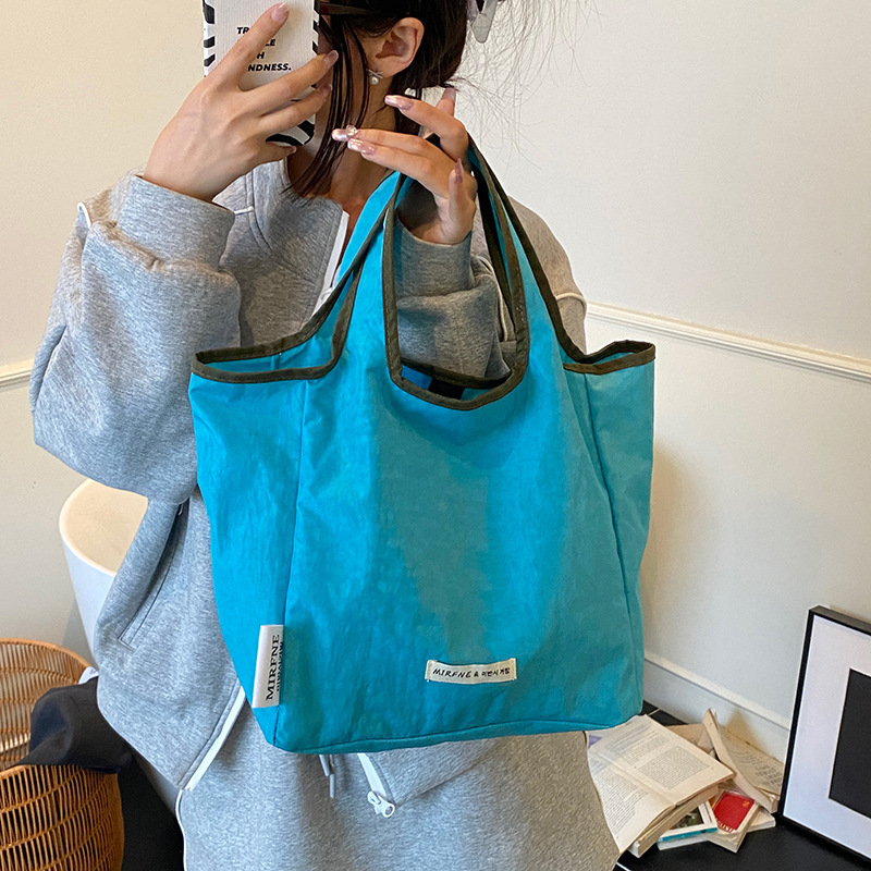 Shake-up marvel tinny al aire libre ocio viento color de choque bolso de hombro de gran capacidad de dopamina cesta de verduras