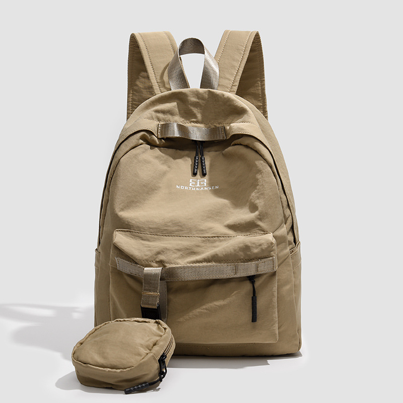 2025 nuevo cross-border simple coreano color sólido mochila de gran capacidad mochila de viaje mochila de hombro