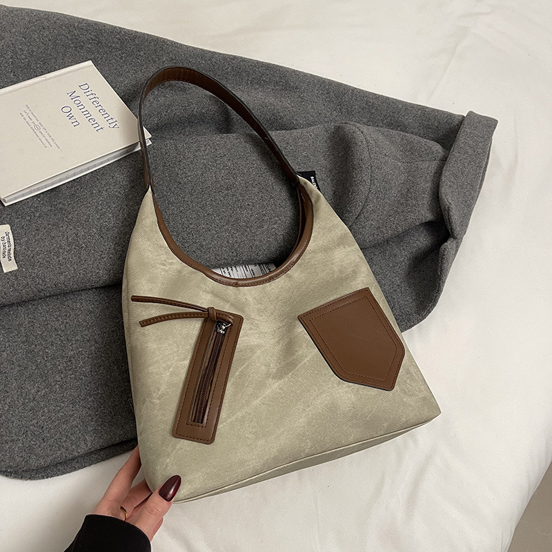 Bolsa de viaje multi-bolsillo 2025, primavera, nuevo retro versátil bolso de hombro de clase, bolsa de gran capacidad para mujeres