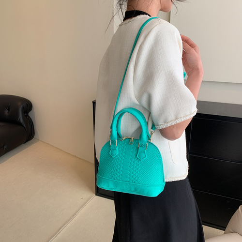 This year's popular women's  spring new fashion retro hand-held shell bag, casual shoulder bag, crossbody bag