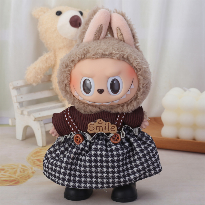 卸売り17センチの布の子供服labubu一二代はパーティーのセットに座って服を着替えます。|undefined