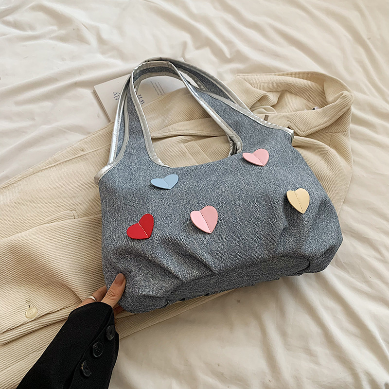 Bolsas de lienzo de nicho coreano para mujeres verano 2024 nueva moda bolsas de bolsa casuales, bolsas de brazo de la niña dulce