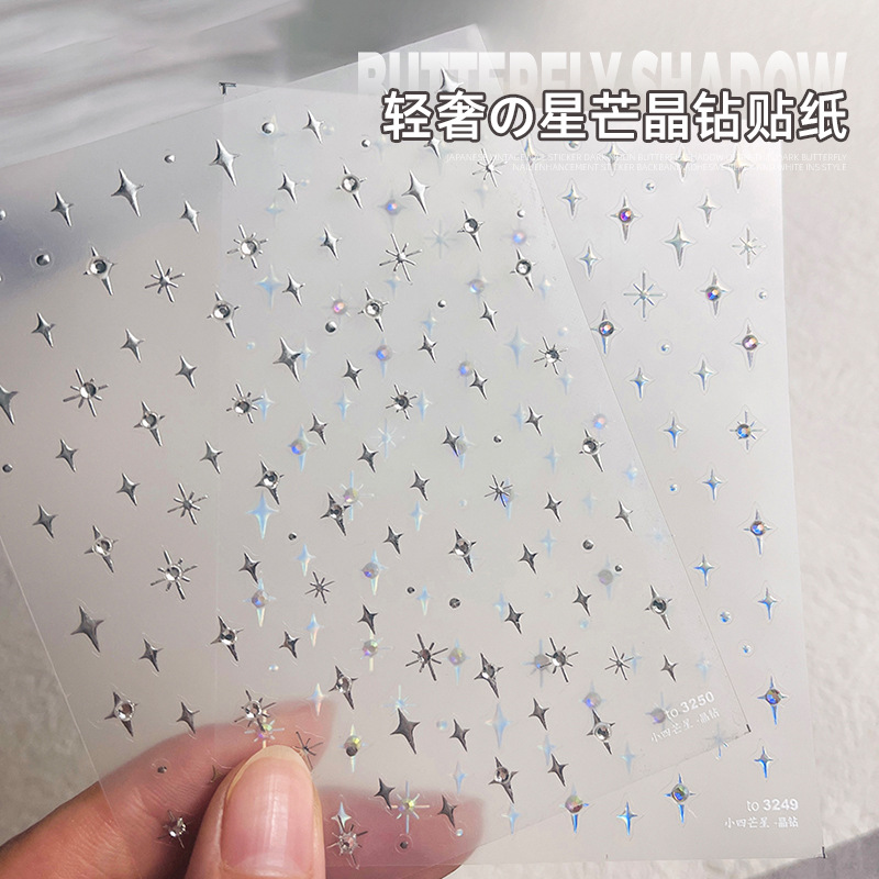 Pegatinas de uñas de oro y plata estrella de cuatro esquinas cristal diamante Super Flash dorado adhesivo pegatinas de uñas flor neta popular al por mayor