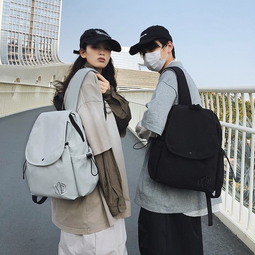 A niche design women's original Japanese lightweight short-distance travel backpack with large capacity, suitable for students and men as a computer and school bag.