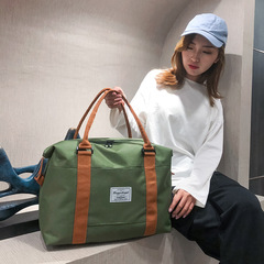 Manufacturer wholesale new travel bag LOGO shoulder bag large capacity short distance handbag luggage bag foreign trade wholesale