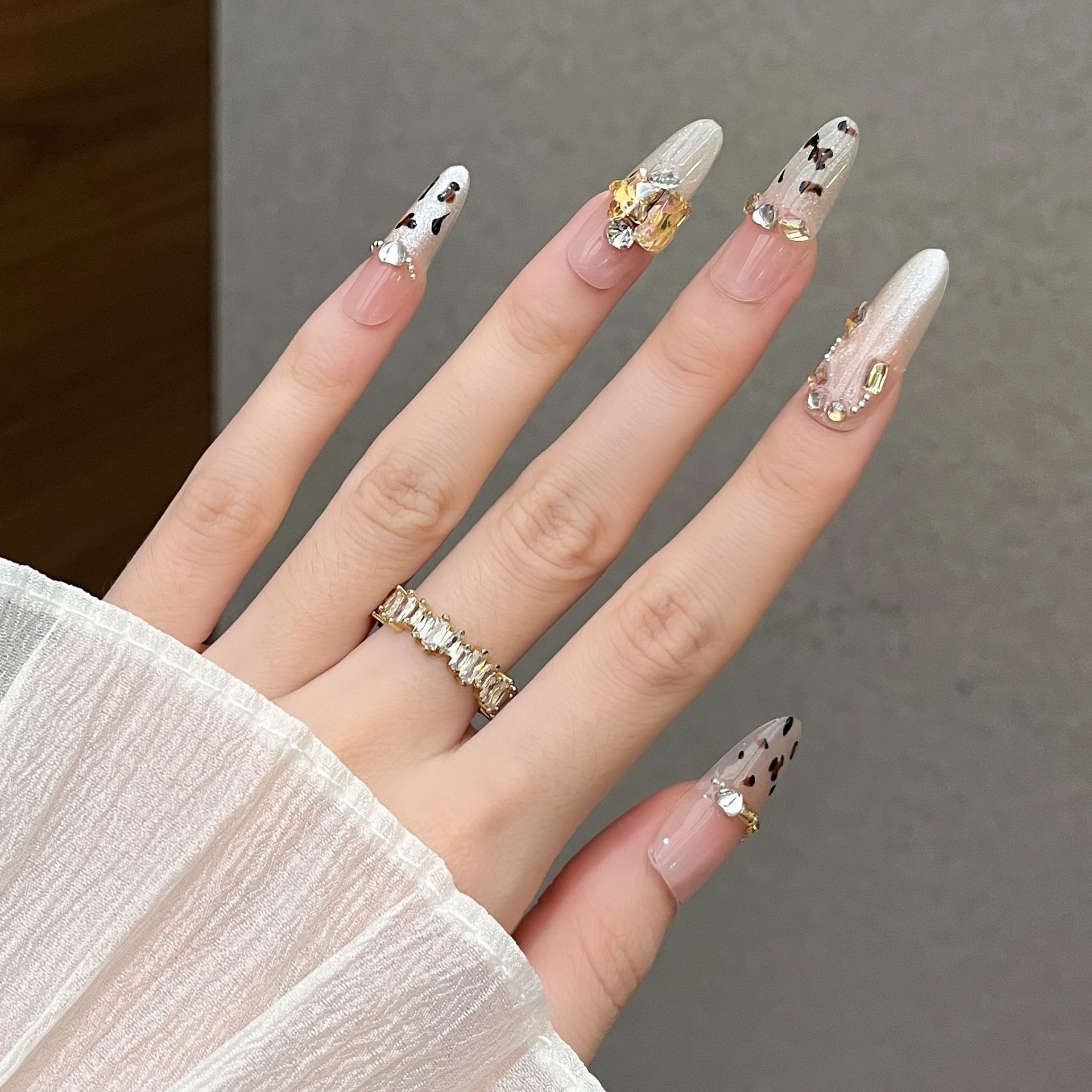 Otoño y invierno puros hechos a mano elípticos leopardo ojo de gato usar piezas de uñas productos terminados explosivo usar parches de uñas de uñas