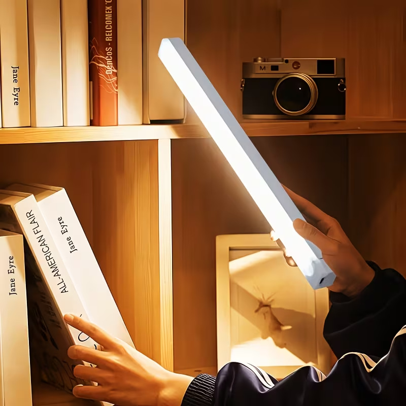 Transfronterizo frío y calentamiento led luz de inducción del cuerpo humano absorción autoadhesiva inalámbrica luz de noche larga barra de lámpara de armario recargable