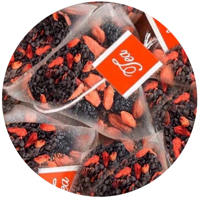 ニラの種のクコ茶の卸売りの源の工場は独立して三角を包んで水を浸して組み合わせのお茶を飲んで男性のお茶を代行します。|undefined