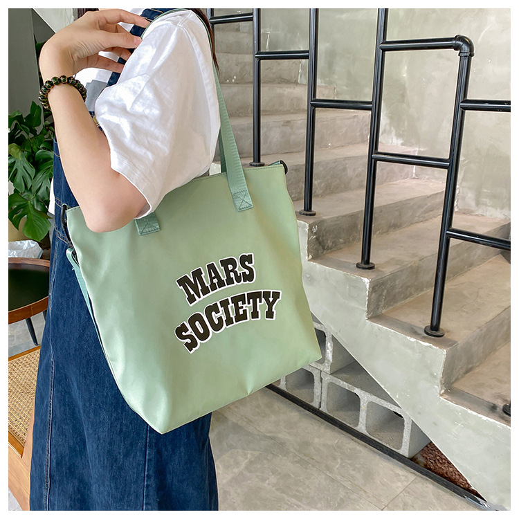 Canvas bag for women, single shoulder, ins crossbody, laid-back style, college student class bag, artistic Japanese style, large capacity, Hong Kong style, chic undefined