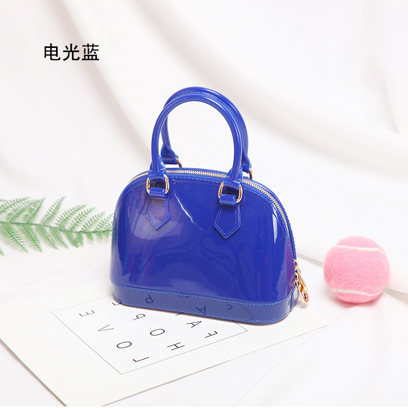 2025 primavera y verano estilo caliente moda casual niños dulces bolsa de gelatina mini bolso de mensajero de un solo hombro variedad al por mayor