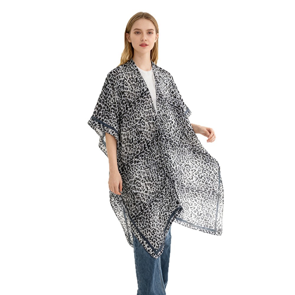 La moda de la playa sexy diosa cardigan con una camiseta de mujer protector solar estampado de leopardo popular 2026 nuevo chal