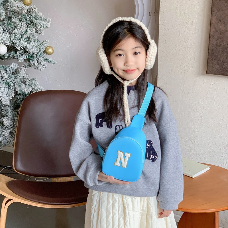 2026 nuevo bolso de pecho para niños letras de moda coreana para niños y niñas bolso de cintura ligero mini bebé