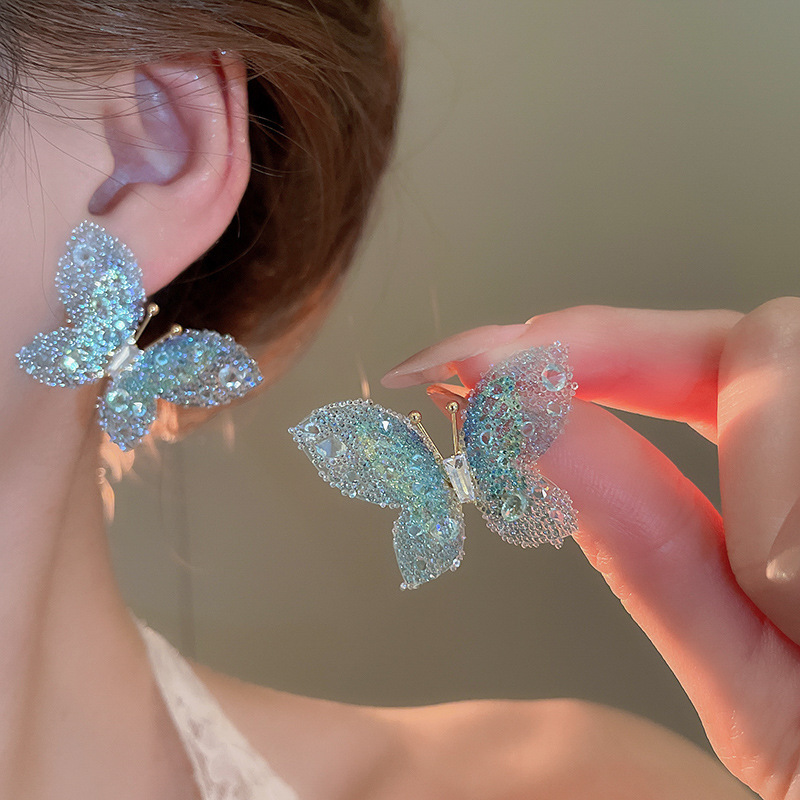 Pendientes de borla de flor de súper hada de plata Pendientes de ins pequeños frescos y dulces Personalidad de moda Pendientes de alta gama al por mayor