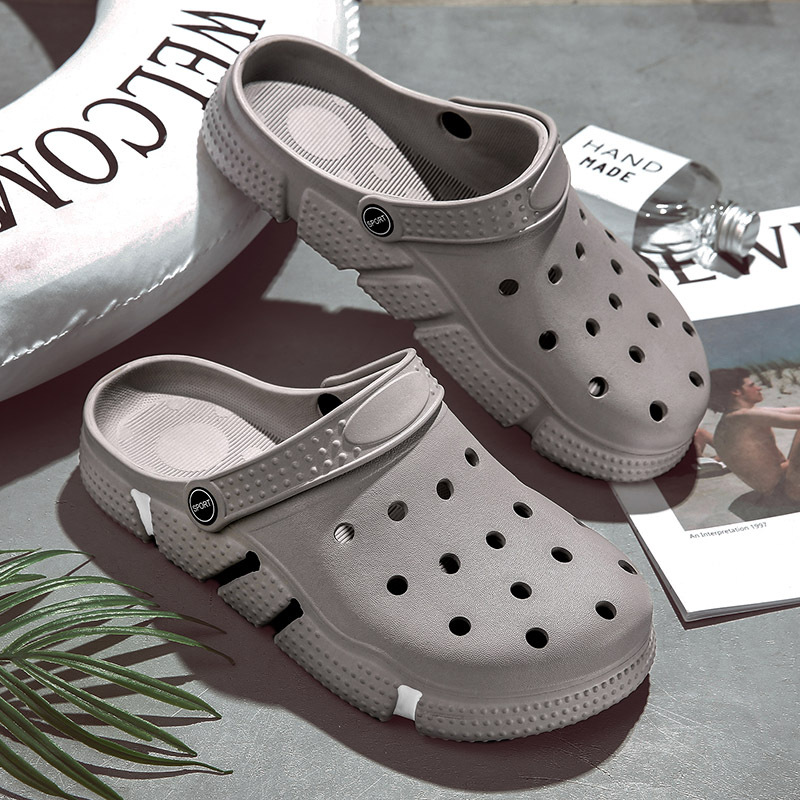 Zapatos de verano de moda para hombres antideslizantes de fondo suave sandalias de cabeza hueca para usar zapatillas de playa de fondo grueso para hombres al por mayor