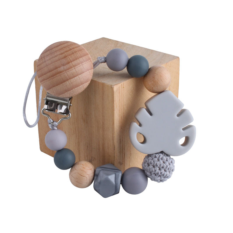 Suministros para bebés Beech chupete clip juguete mordedor bebé calmante hoja de silicona molar Cadena de chupete cadena anti-caída