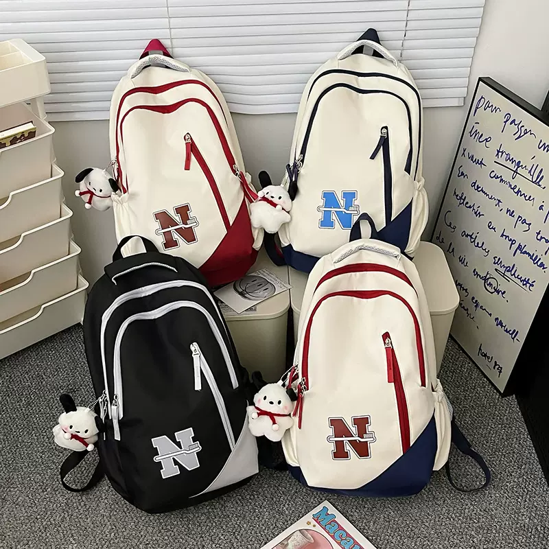 双肩包2024新款书包韩版时尚大容量撞色背包大学生个性包包代发