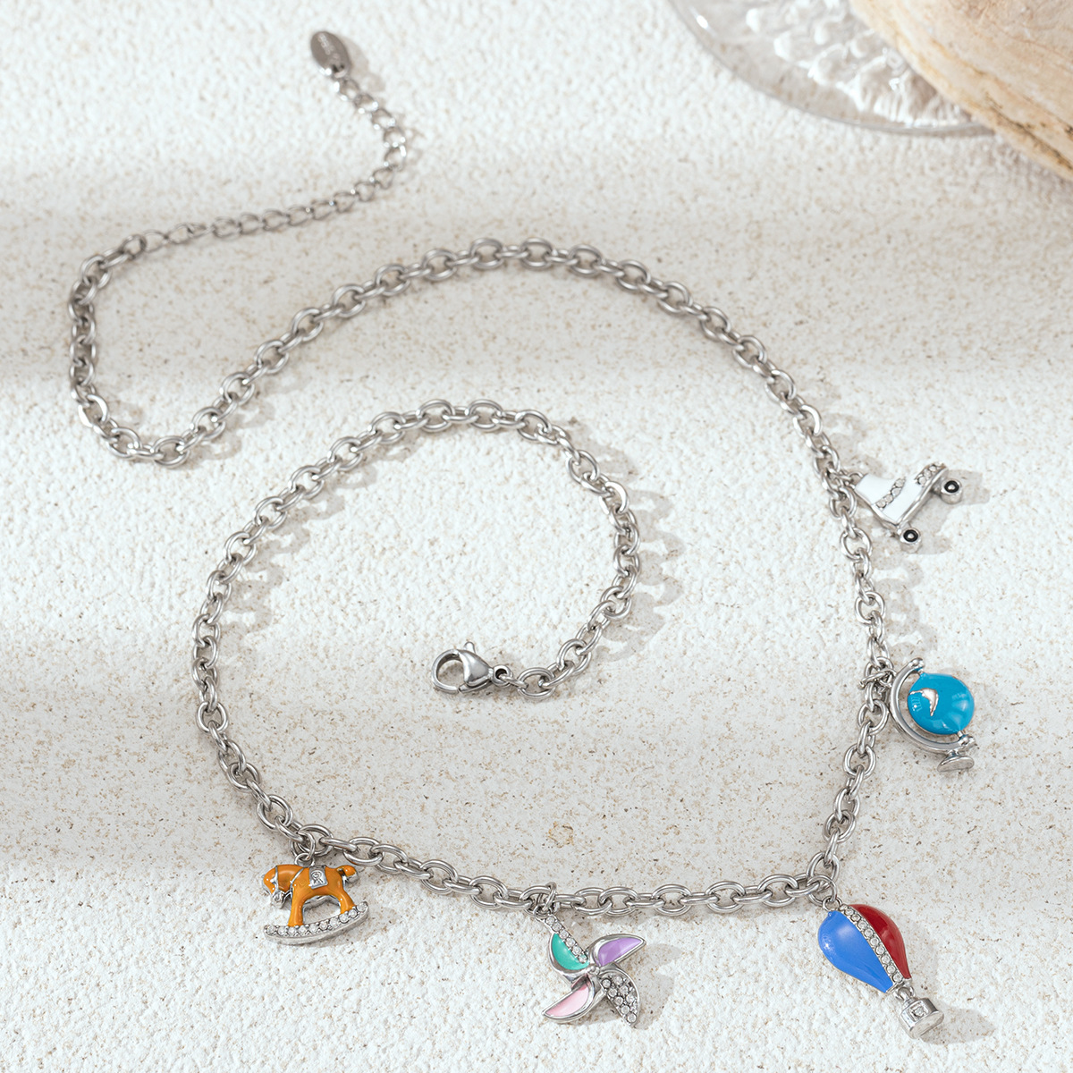 Collar de acero inoxidable de la UE y los Estados Unidos, lujo ligero, nicho de oro blanco, molino de viento natural, collar de colgante para mujeres no se desvanece