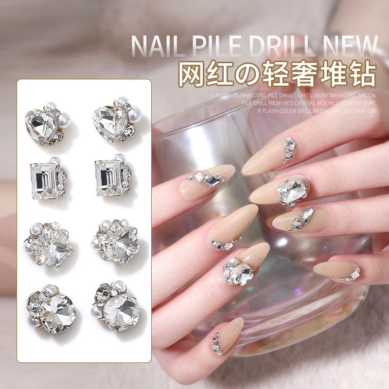 Popular online celebridad uñas pila de cristal diamante acabado blanco súper brillante corazón torcido grasa cuadrado incrustaciones perla decoraciones de uñas al por mayor