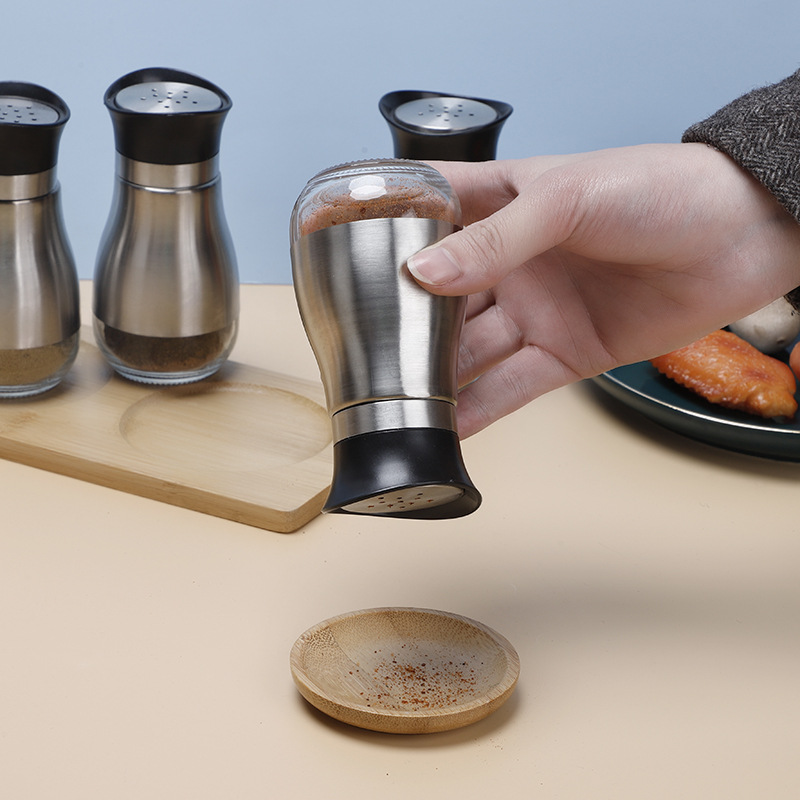 Venta al por mayor de acero inoxidable cocina condimento botella sellada tarro hogar condimento botella combinación traje comino pimienta tarro
