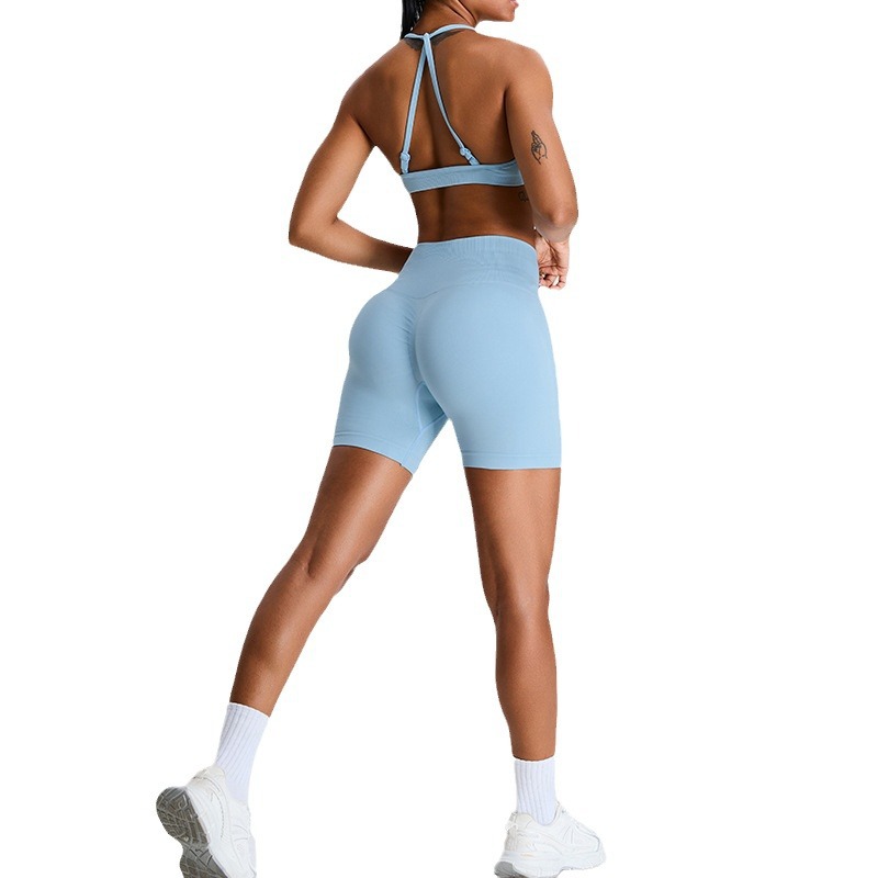 Nuevos pantalones cortos transfronterizos de yoga de melocotón sin costuras sexy de espalda deportiva de chicas calientes para correr set de ropa de fitness