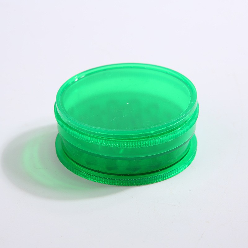 Fábrica directa de cigarrillos transfronterizos venta caliente molino de humo de plástico de tres capas 60mm molino manual triturador de humo